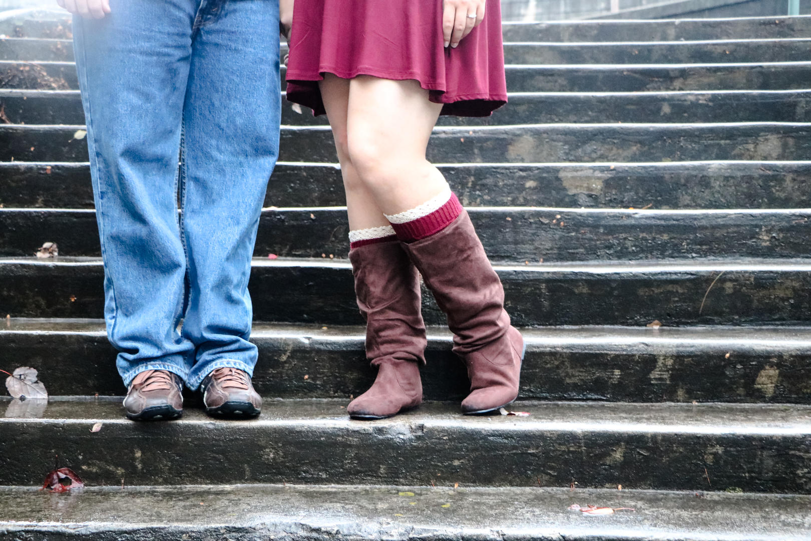 Picture of Haleigh and Sean's feet outside on a set of stairs
