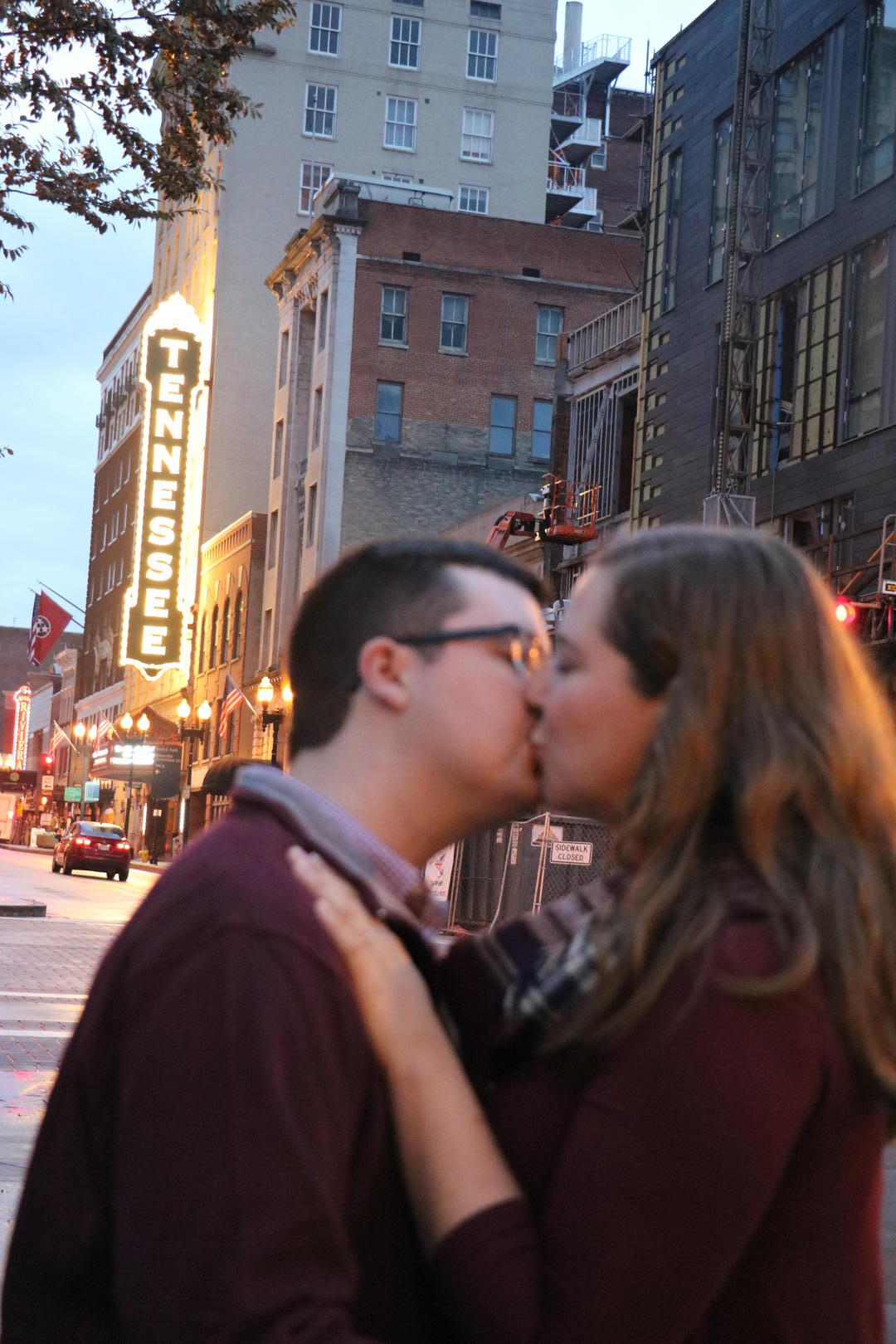Haleigh and Sean kissing on Gay Street in downtown Knoxville, Tennessee
